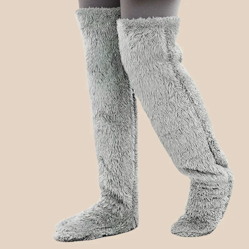 Close-up of plush Classic Grey fleece over-the-knee leg warmers showing the soft, blanket-like texture